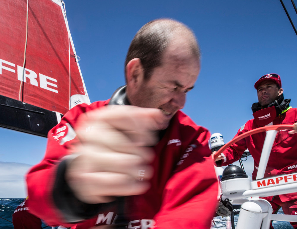 November 21, 2014. Leg 2 onboard MAPFRE. Jean Luc Nelias trimming the sails.